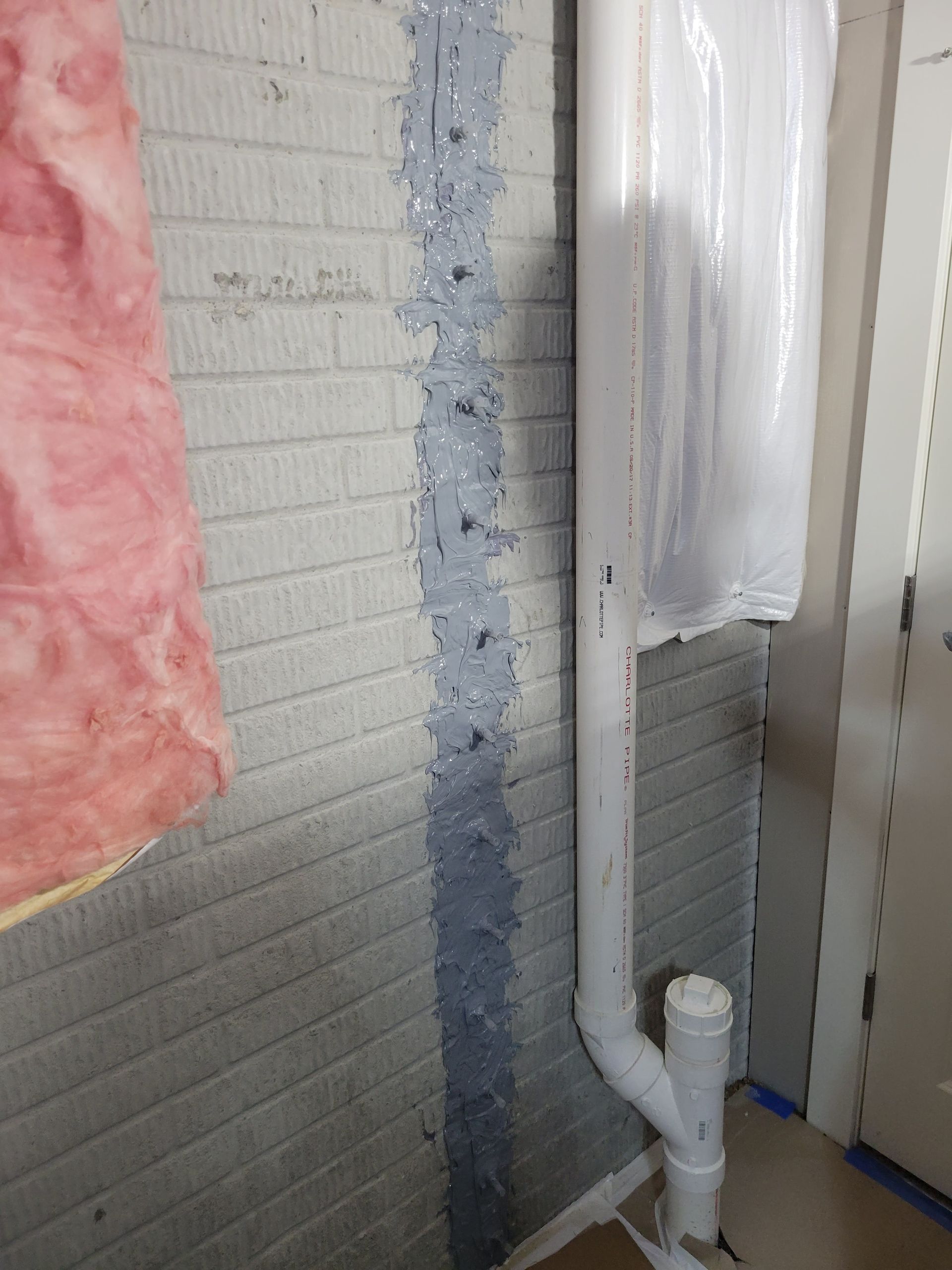 Waterproofed basement bricks