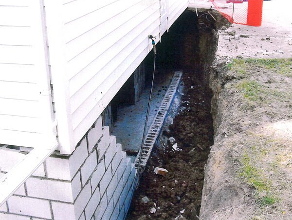 basement foundation in Cuyahoga Falls, Ohio during the middle of a repair
