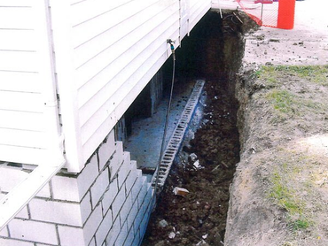 basement wall being replaced