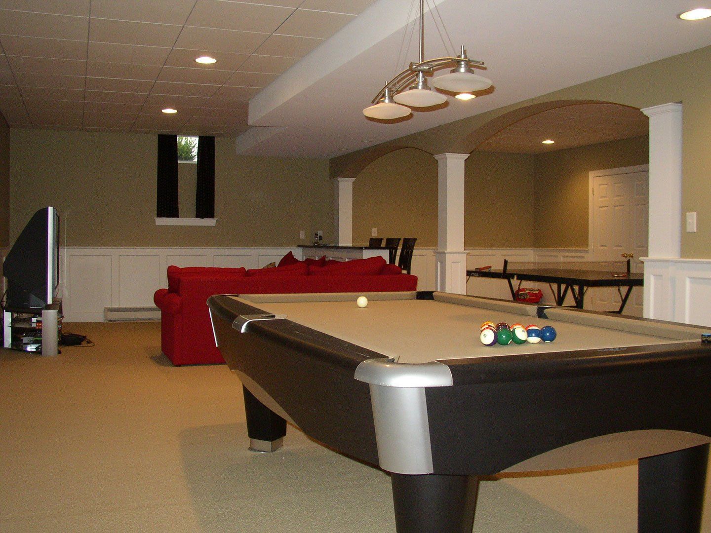 Akron, OH area basement with pool table after basement remodeling