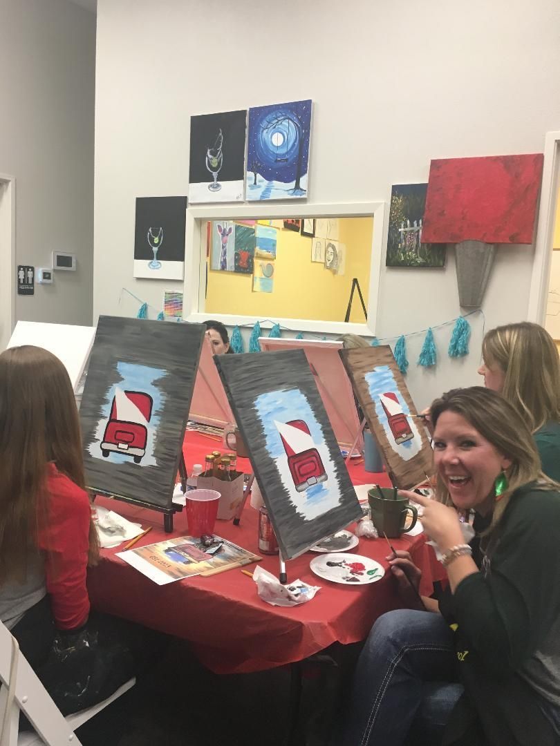 adults painting in class