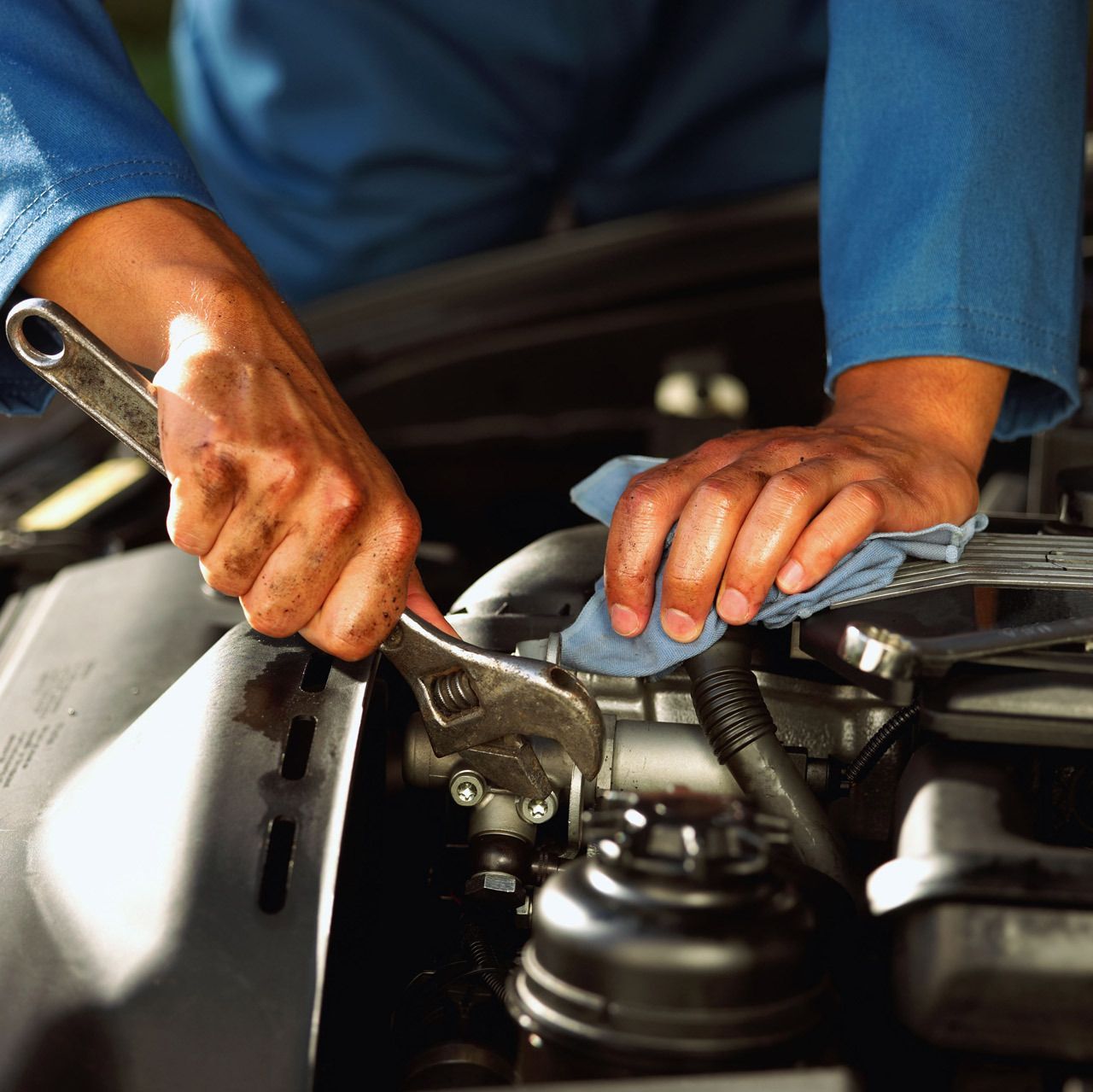 A mechanic repairing a car | Laurel Hill Automotive & Tire
