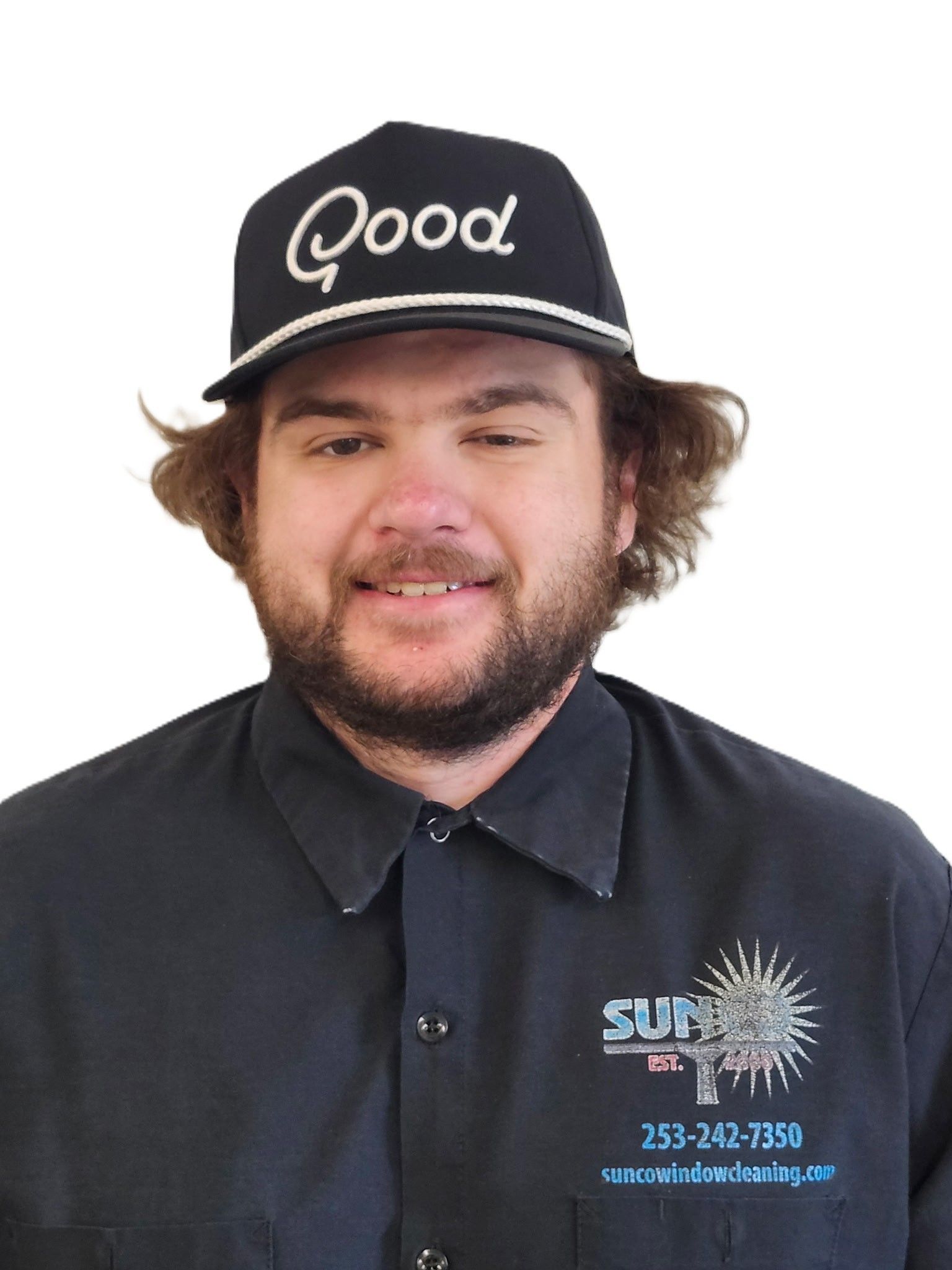 A man wearing a black hoodie with a sun on it
