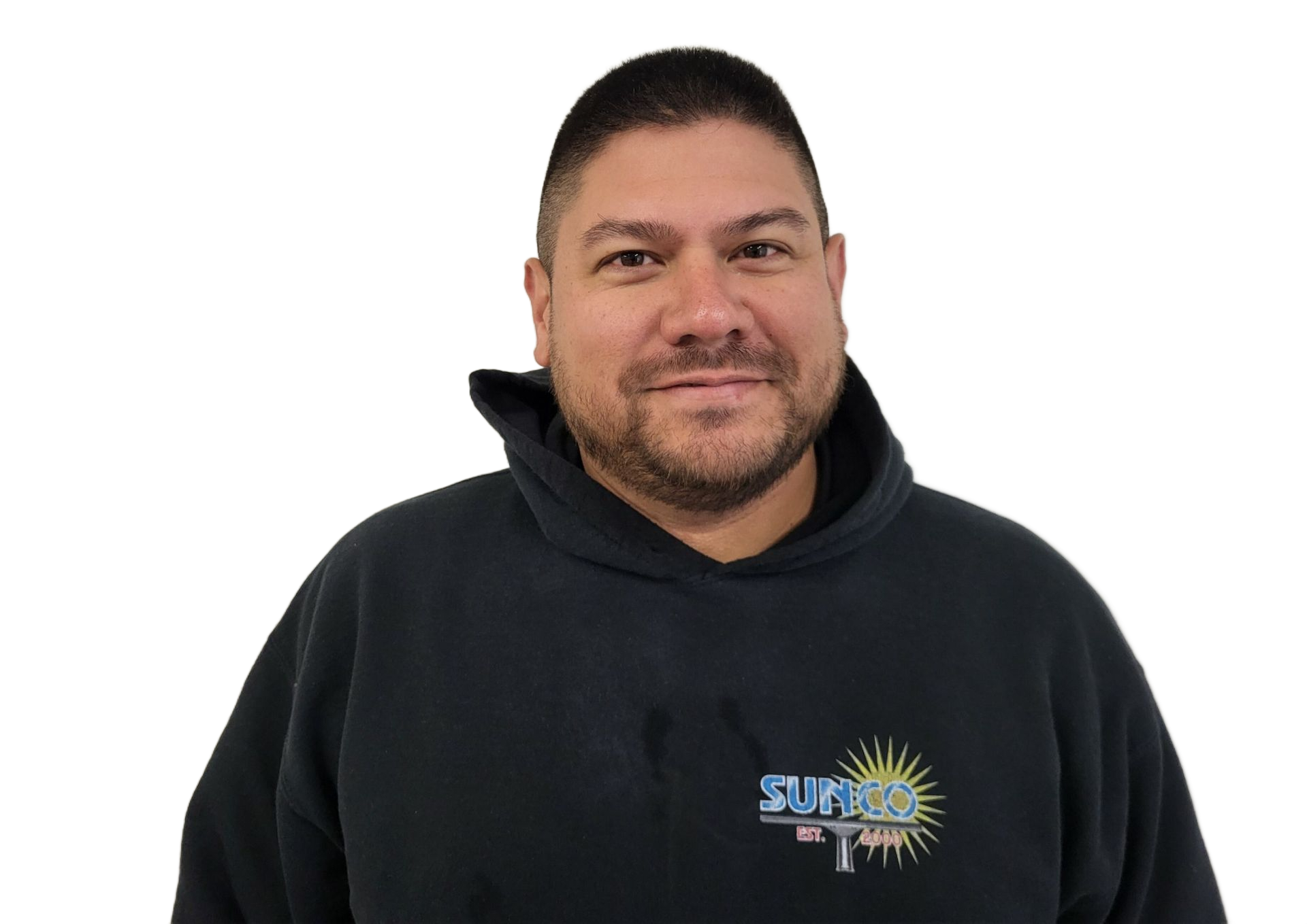 A man wearing a black hoodie with a sun on it