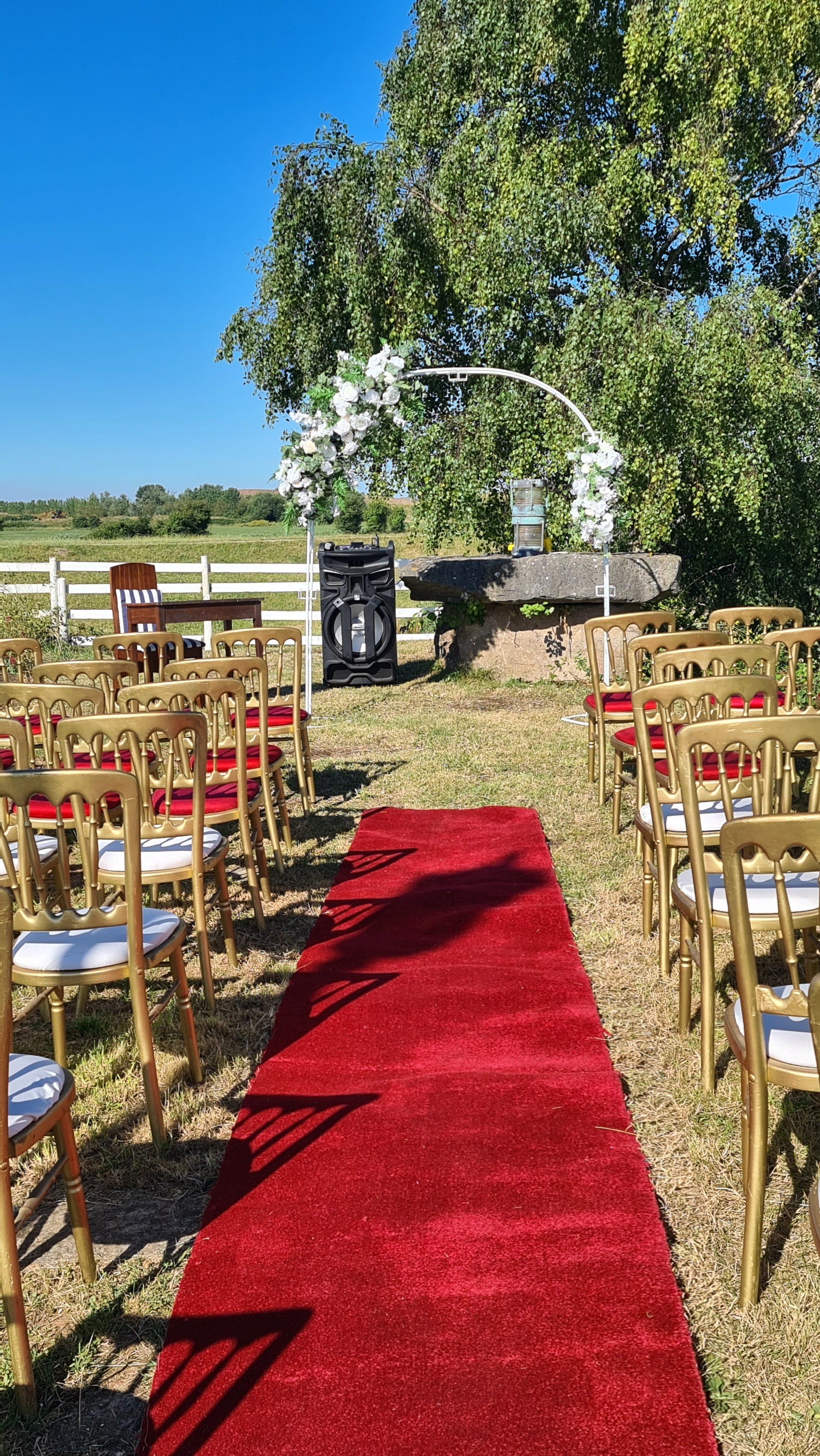 The wedding ceremony aisle, outside on the sea wall at the West Usk Lighthouse.