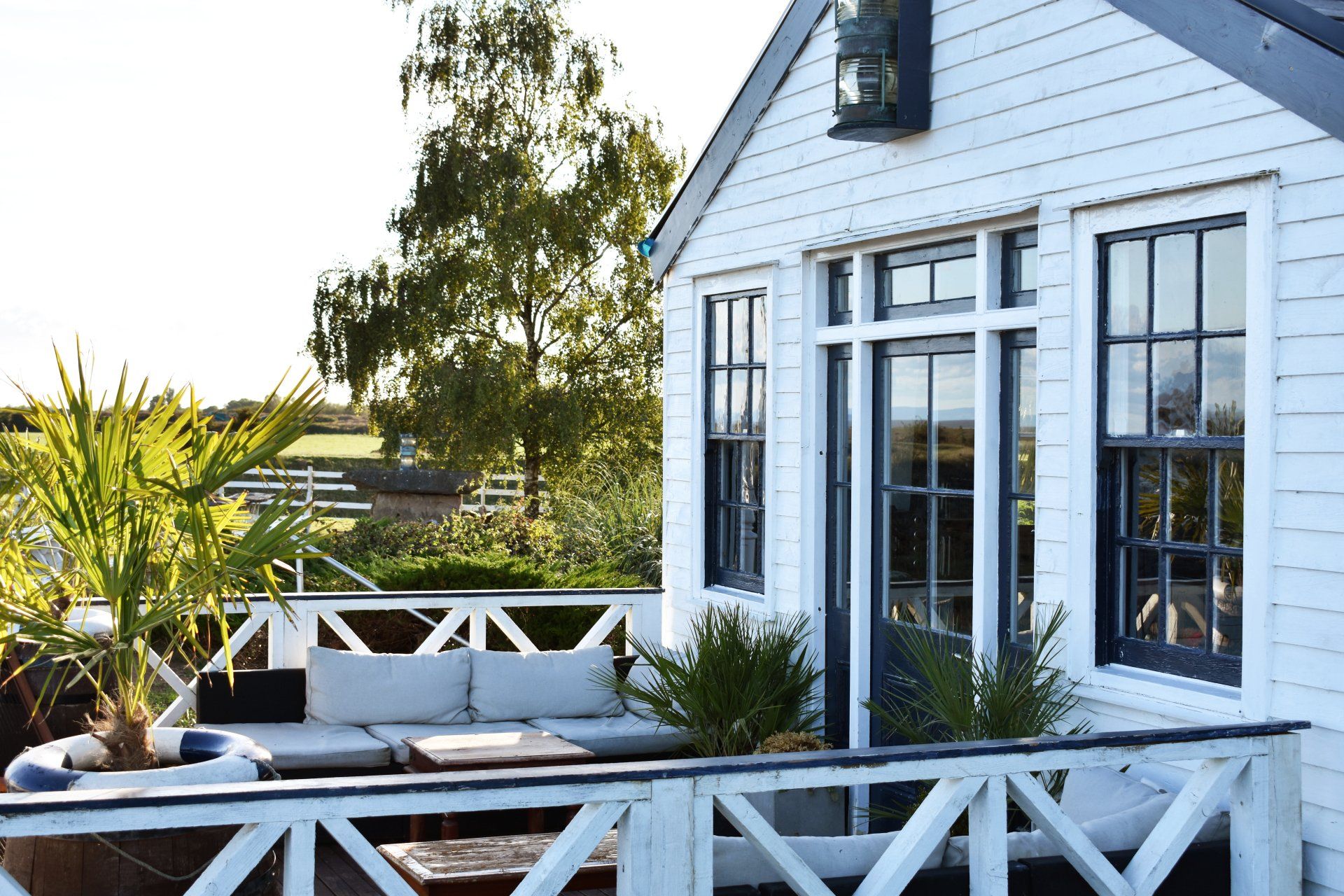 The decking area at the front of the lodge at the West Usk Lighthouse.