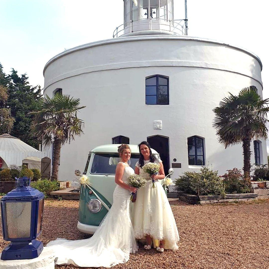 A wedding couple at the West Usk Lighthouse (two women, same-sex).