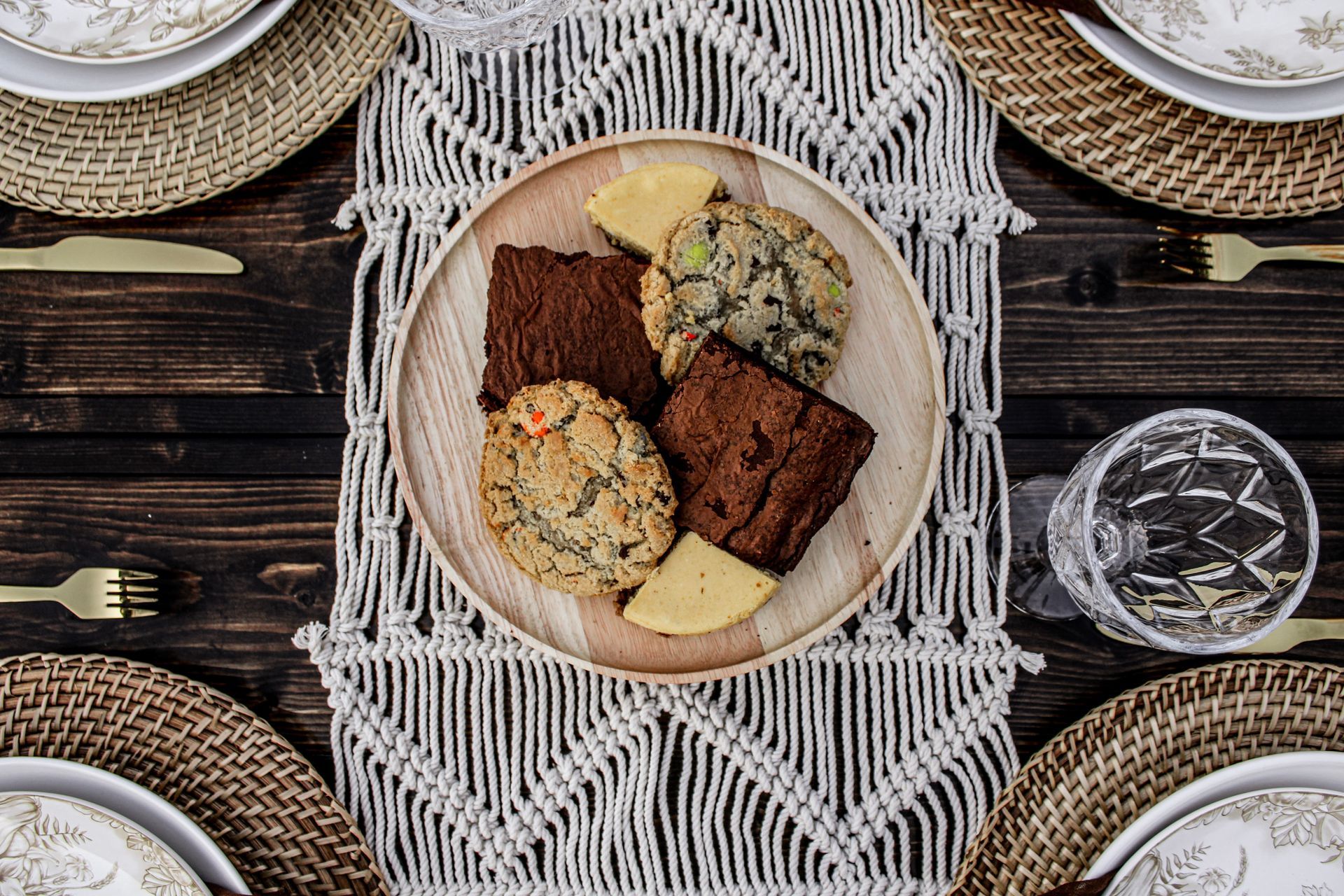 A plate of food is sitting on a wooden table.