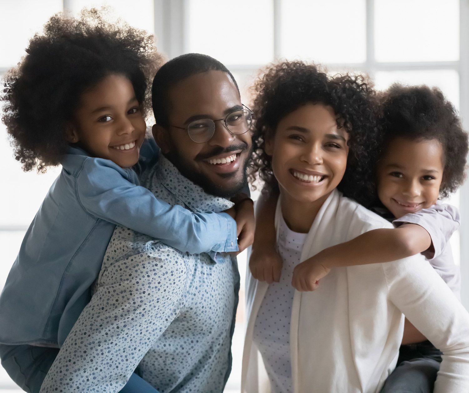 Smiling Family — Dallas, TX — Wings of the Future