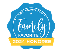 Philadelphia Family Favorite 2024 Honoree badge: blue and yellow with