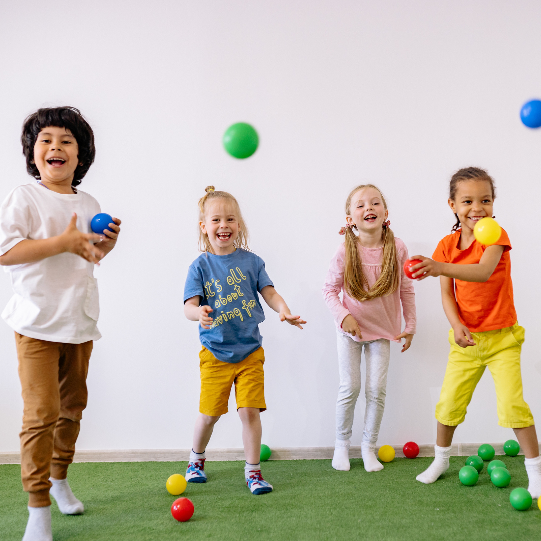 Children playing with bouncy balls