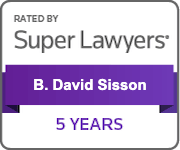 A purple ribbon with the words `` rated by super lawyers '' on it.