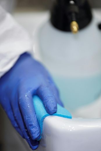 A chem dry machine is being used to clean a carpet