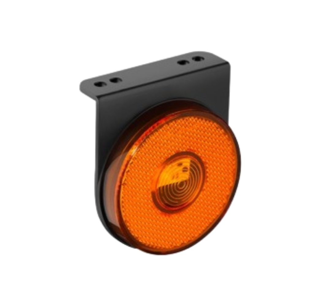 Um item de plástico cinza com um furo no meio em um fundo branco.