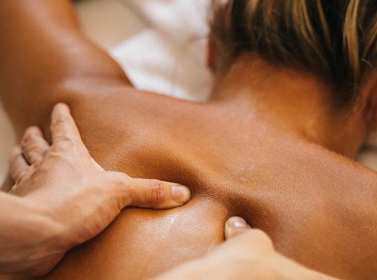 The Skinutrition Clinic providing a relaxing massage as part of a spa experience in Coventry