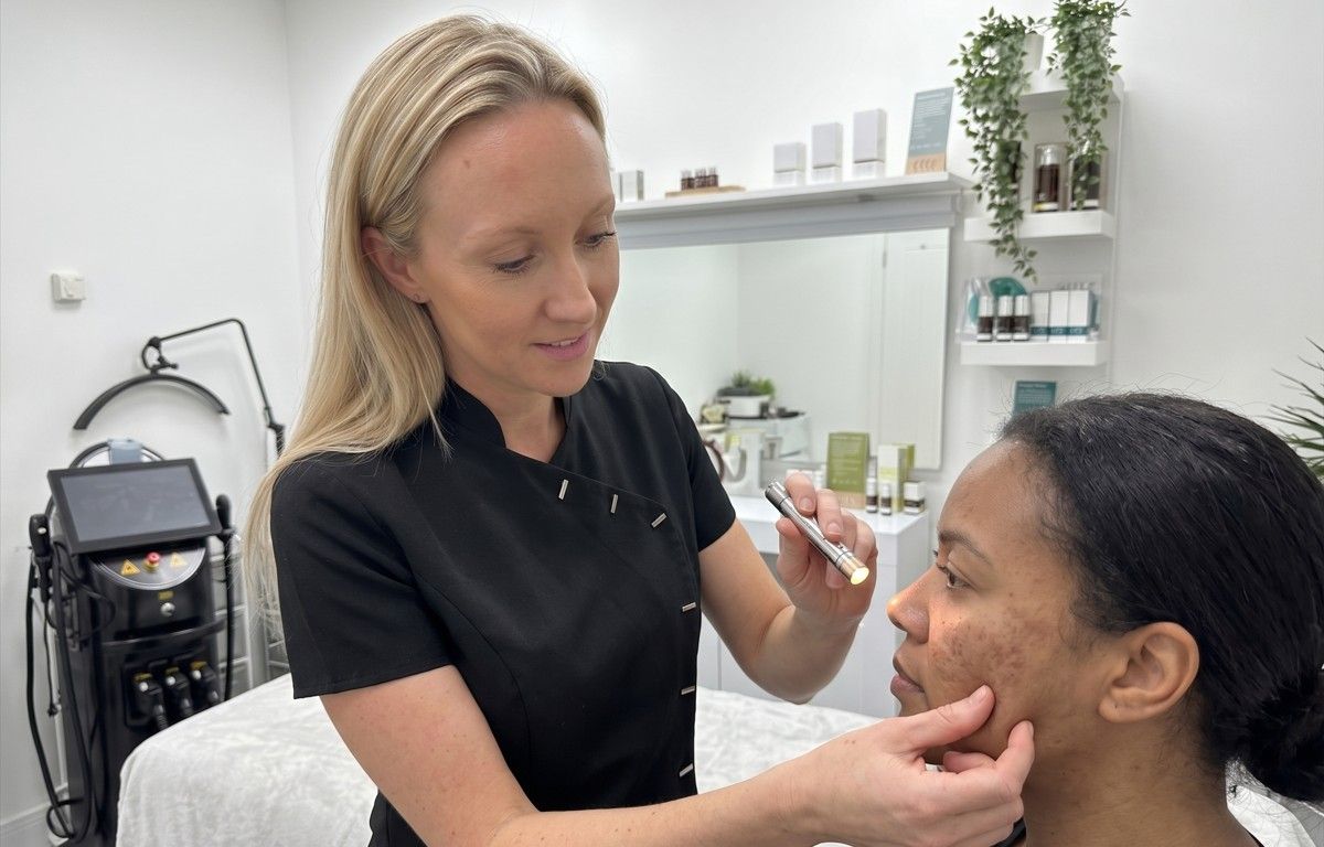 The Skinutrition Clinic applying a chemical peel treatment for acne