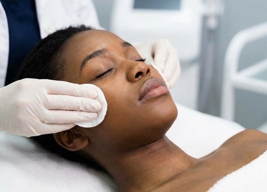 Thoroughly cleaning the skin to remove any dirt, oil, or makeup with a cotton pad before applying Salicylic acid peel.