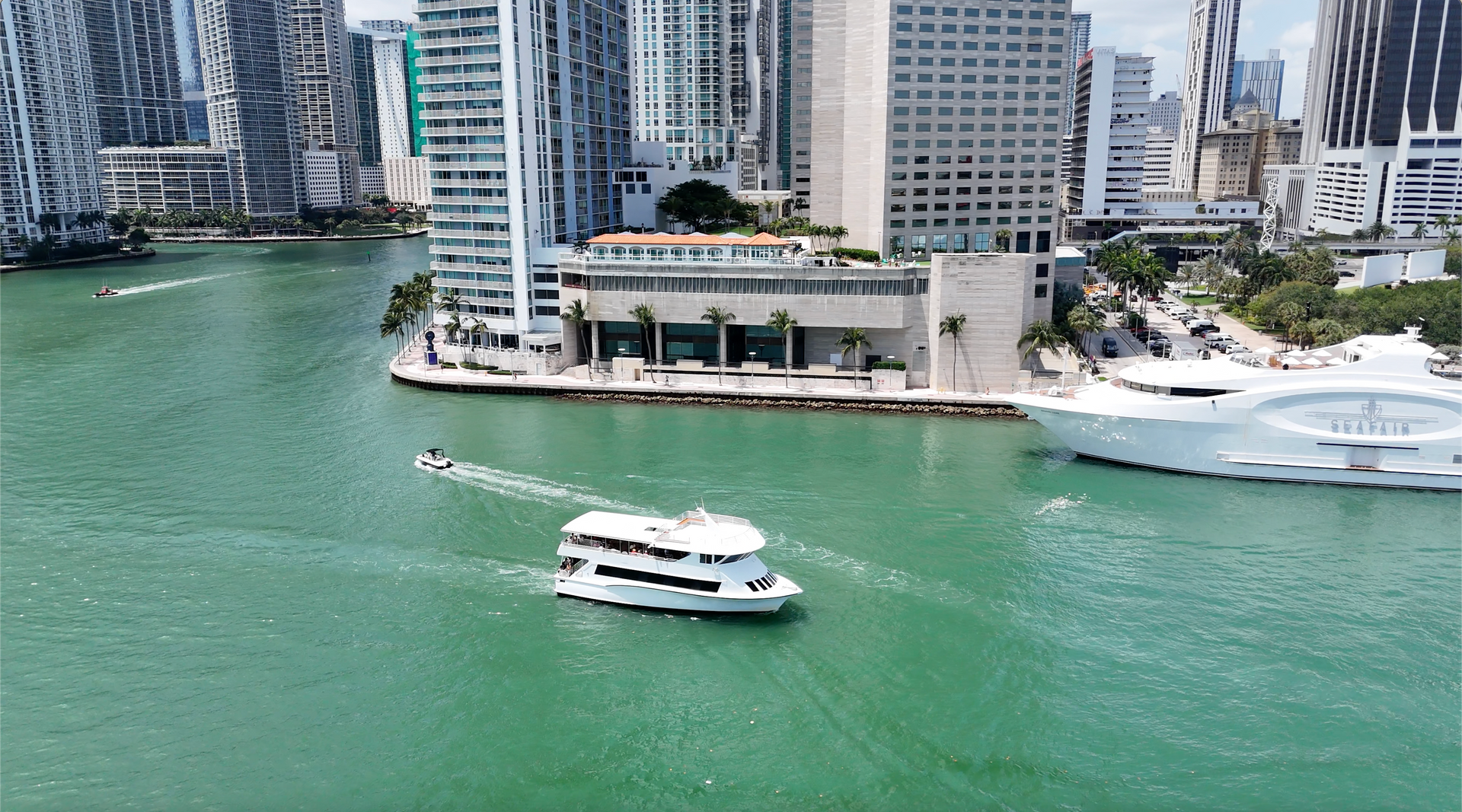 Miami Celebrity all in one Boat Cruise cruising by the Miami Skyline
