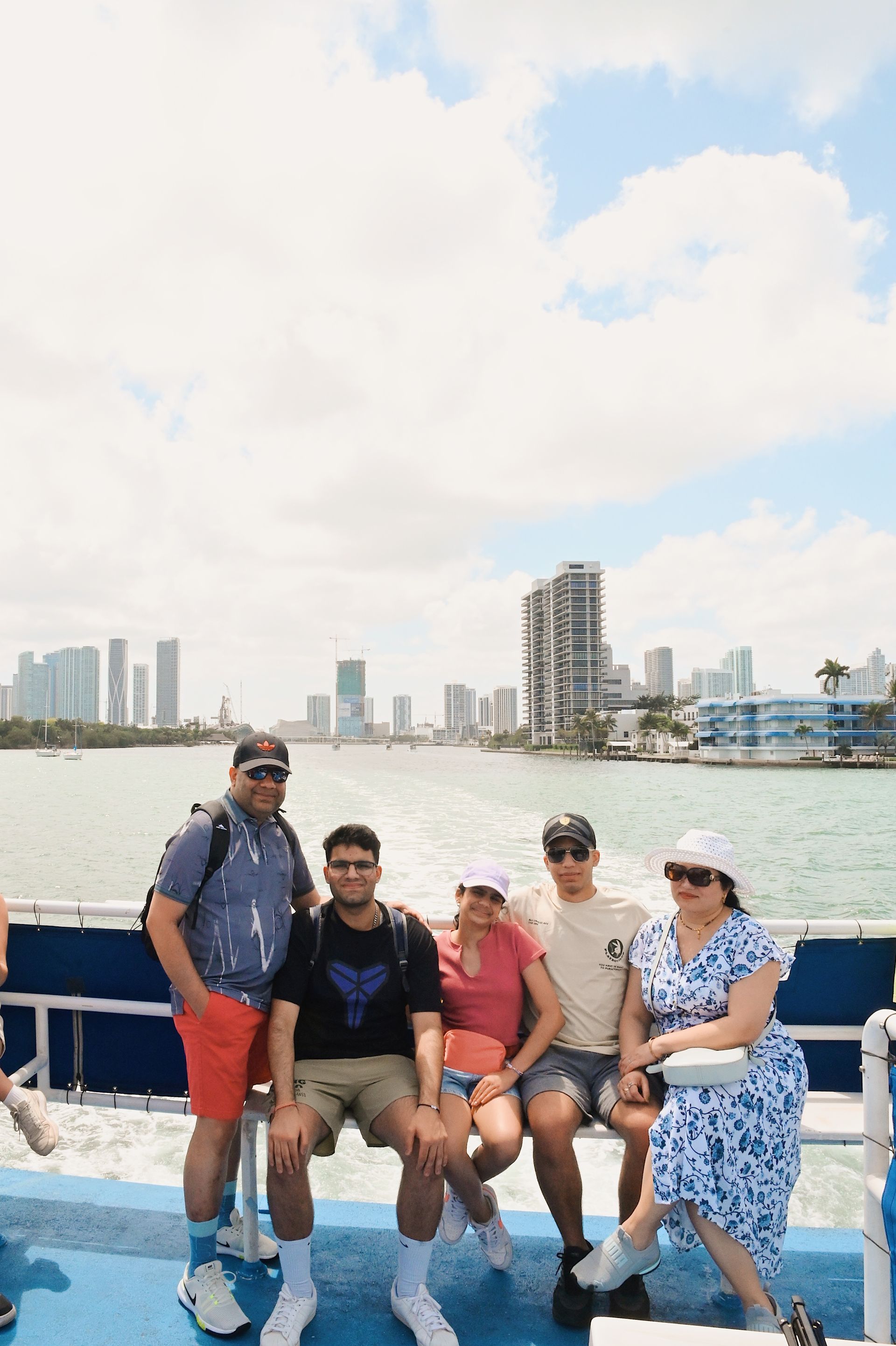 Family on the Boat tour in Miami with the Skyline