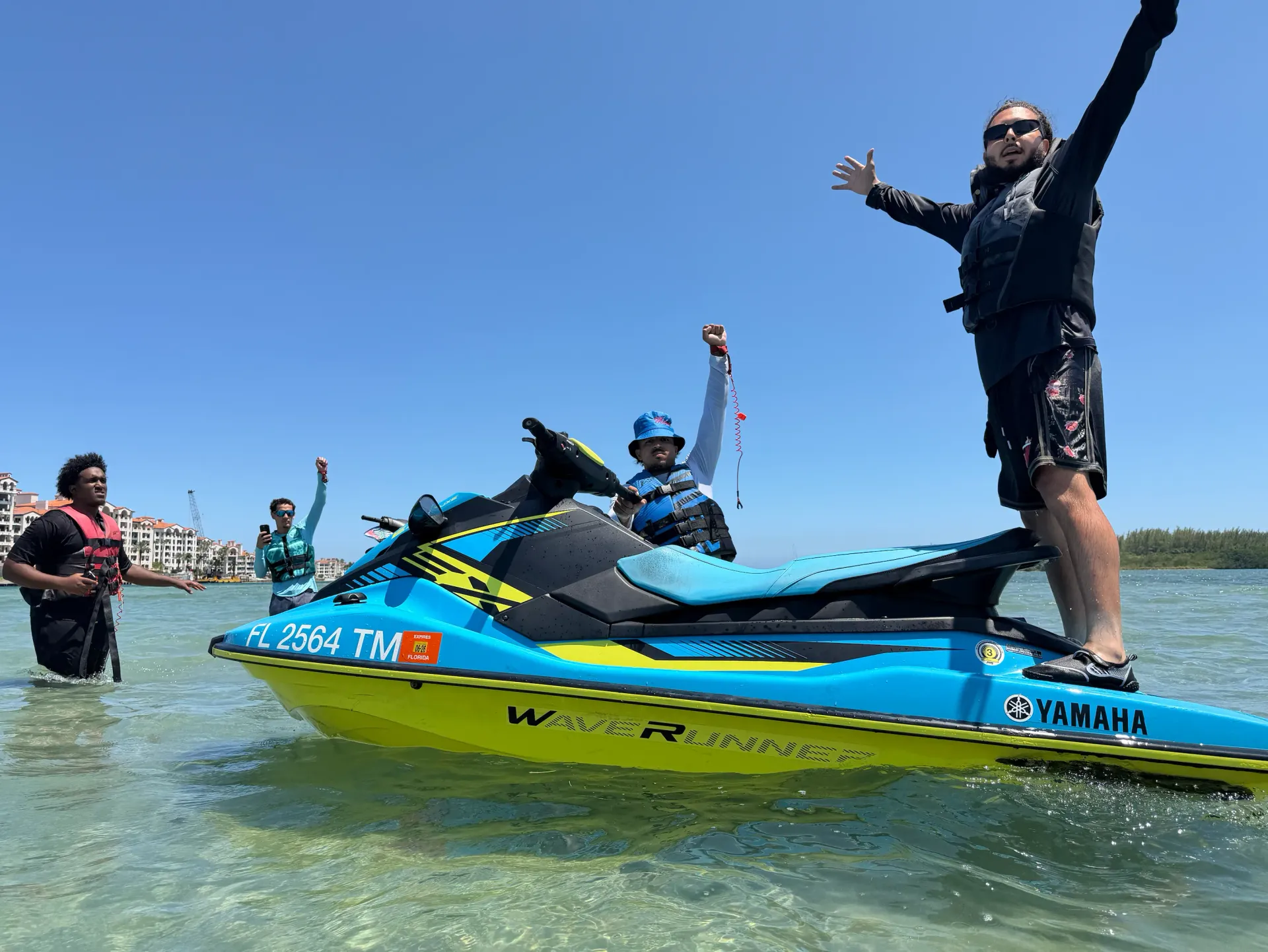 Guests enjoying the Official Bayside Jet Ski Tours sandbar adventure in Miami
