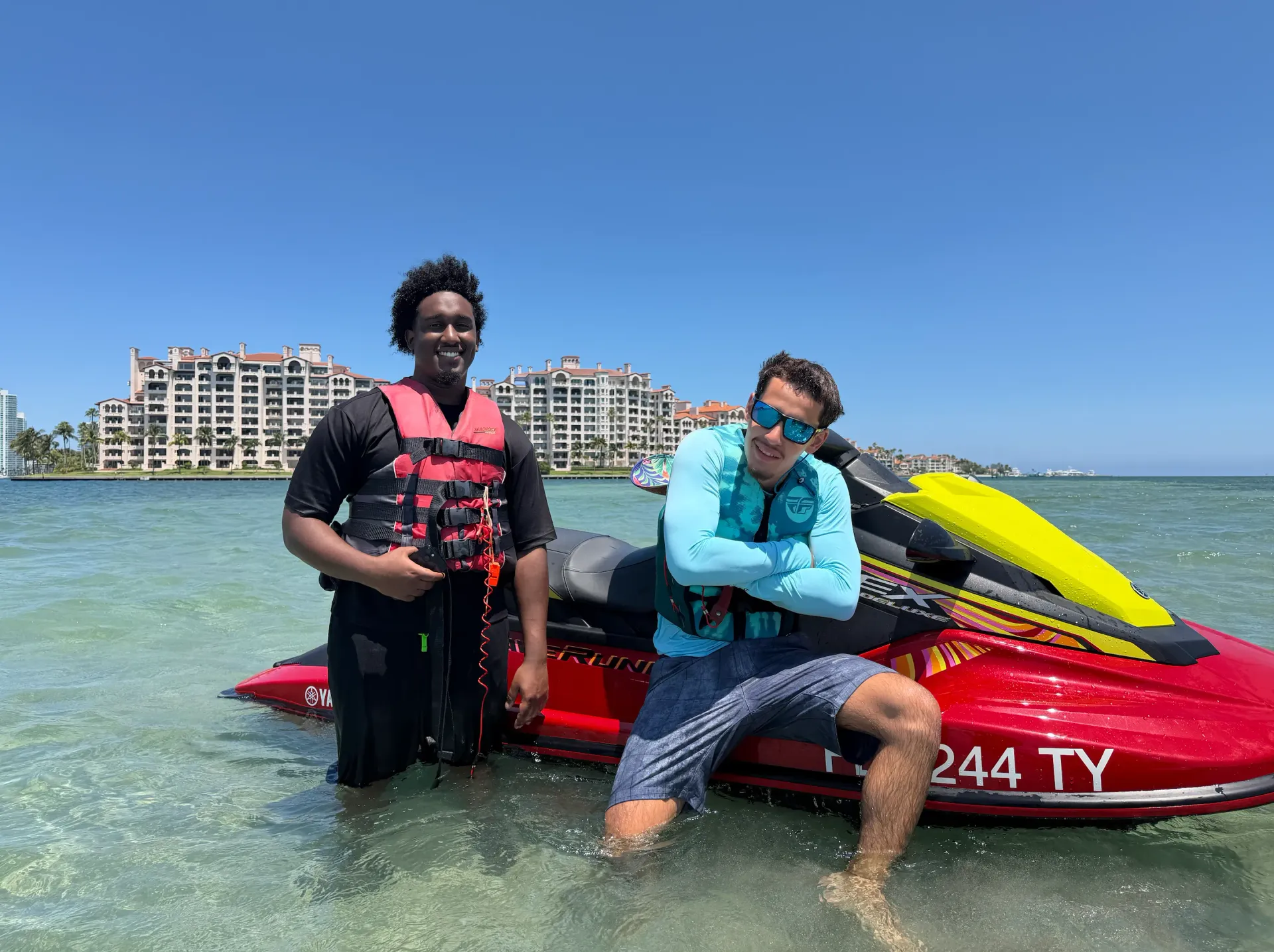 Guests enjoying family-friendly Miami Jet Ski Rentals near Fisher Island on Biscayne Bay
