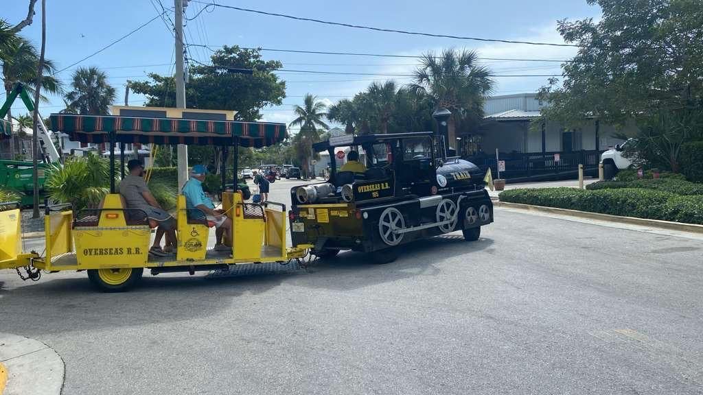 Key West Conch Tour Train carrying passengers through downtown Key West