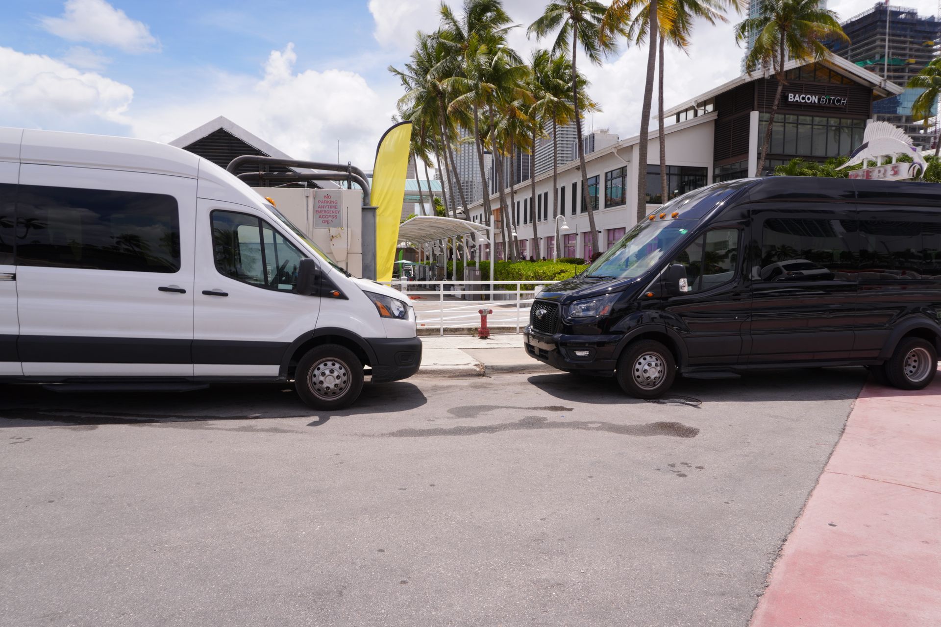 the two sightseeing Bust tours parked in Bayside Marketplace