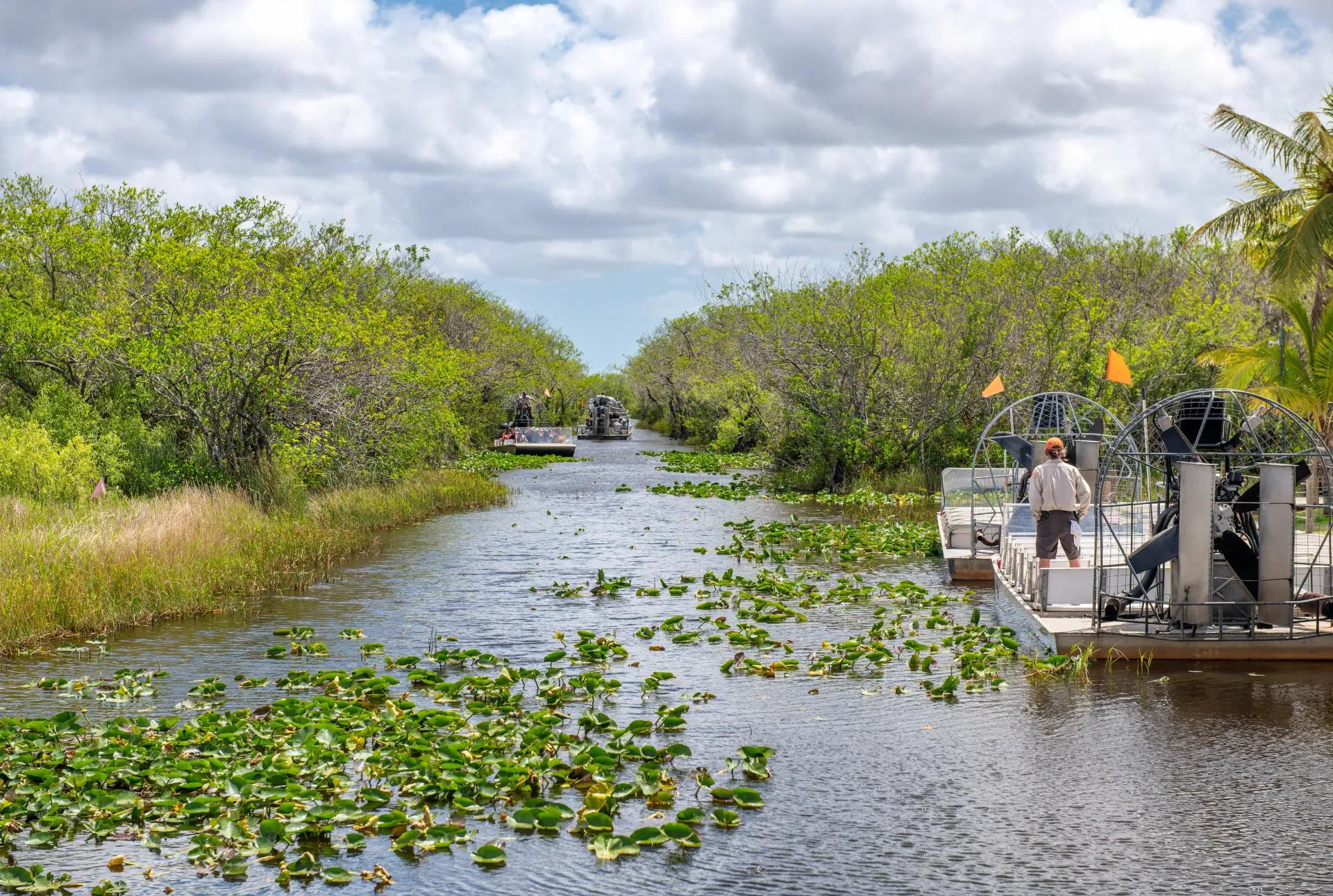 Miami Everglades Tours airboats traveling through the waterways of the Florida Everglades