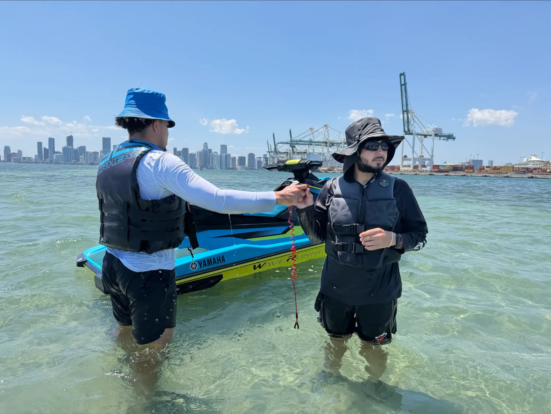 Guests enjoying the sandbar stop during a Miami Jet Ski Tour on Biscayne Bay