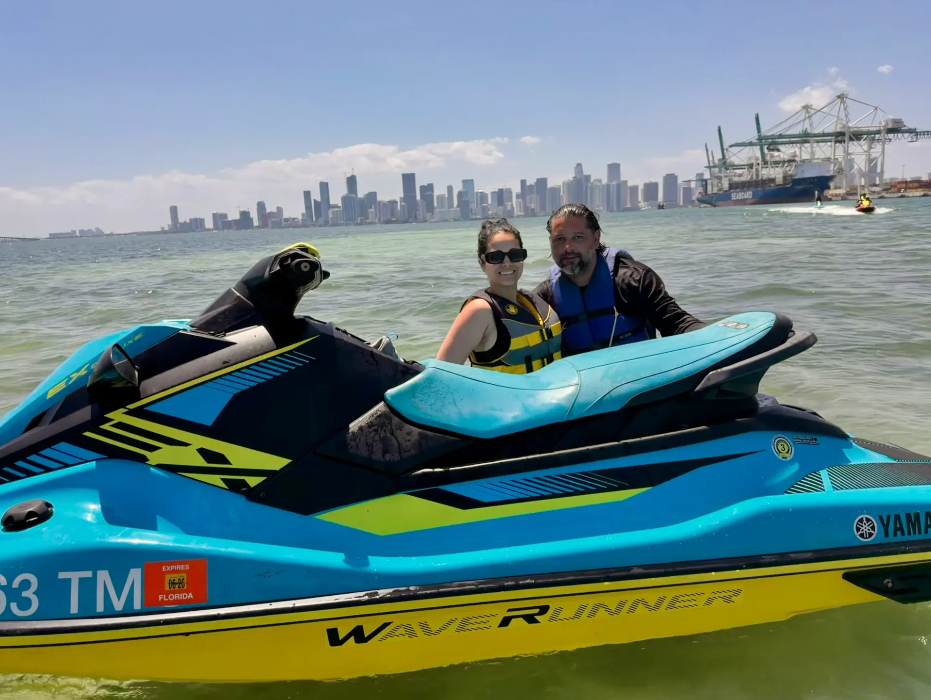 Guests enjoying Miami Jet Ski Tours with Miami skyline views from Biscayne Bay
