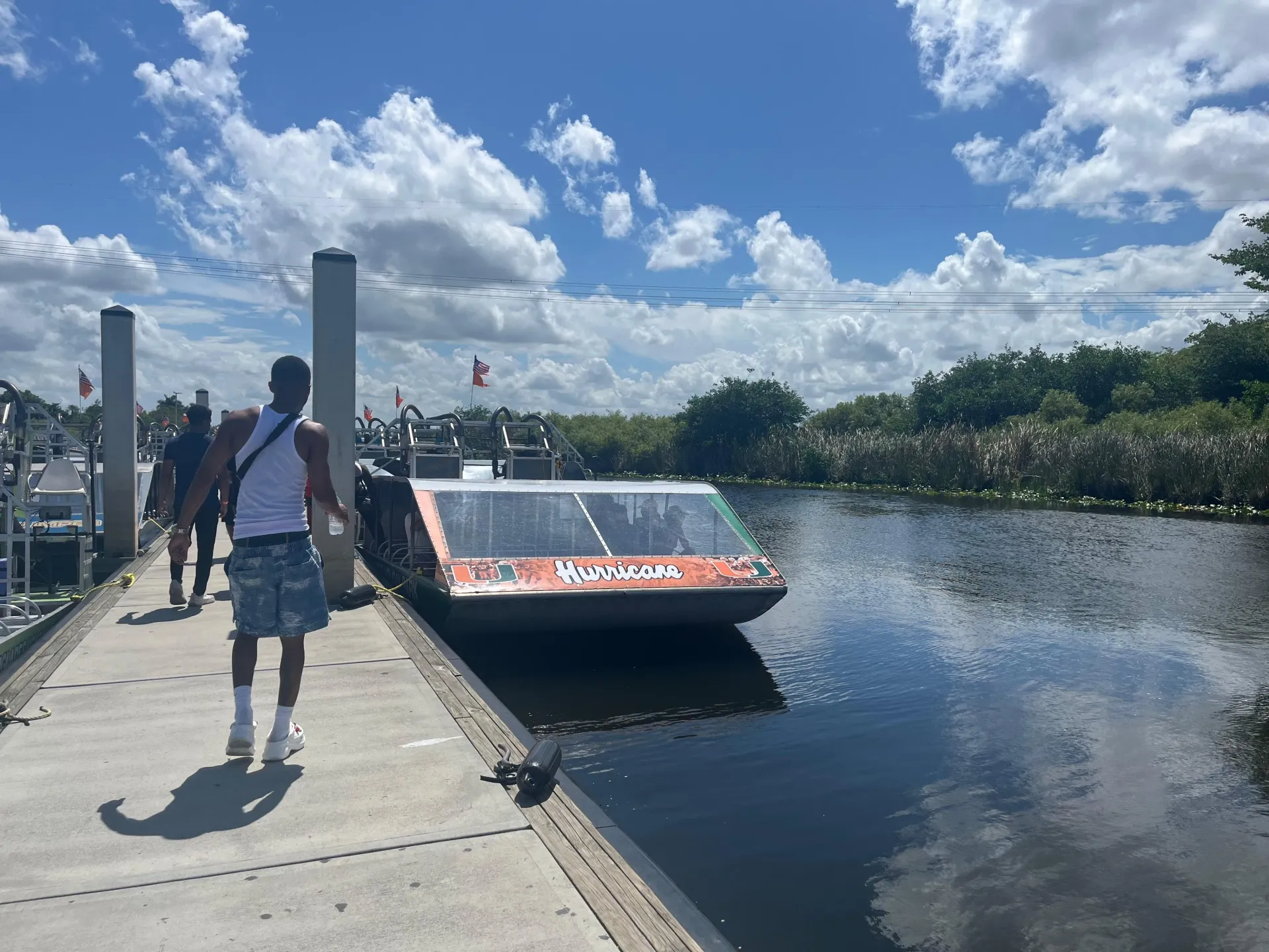 Guests arriving at the airboat dock before a Miami nature tour through the Florida Everglades