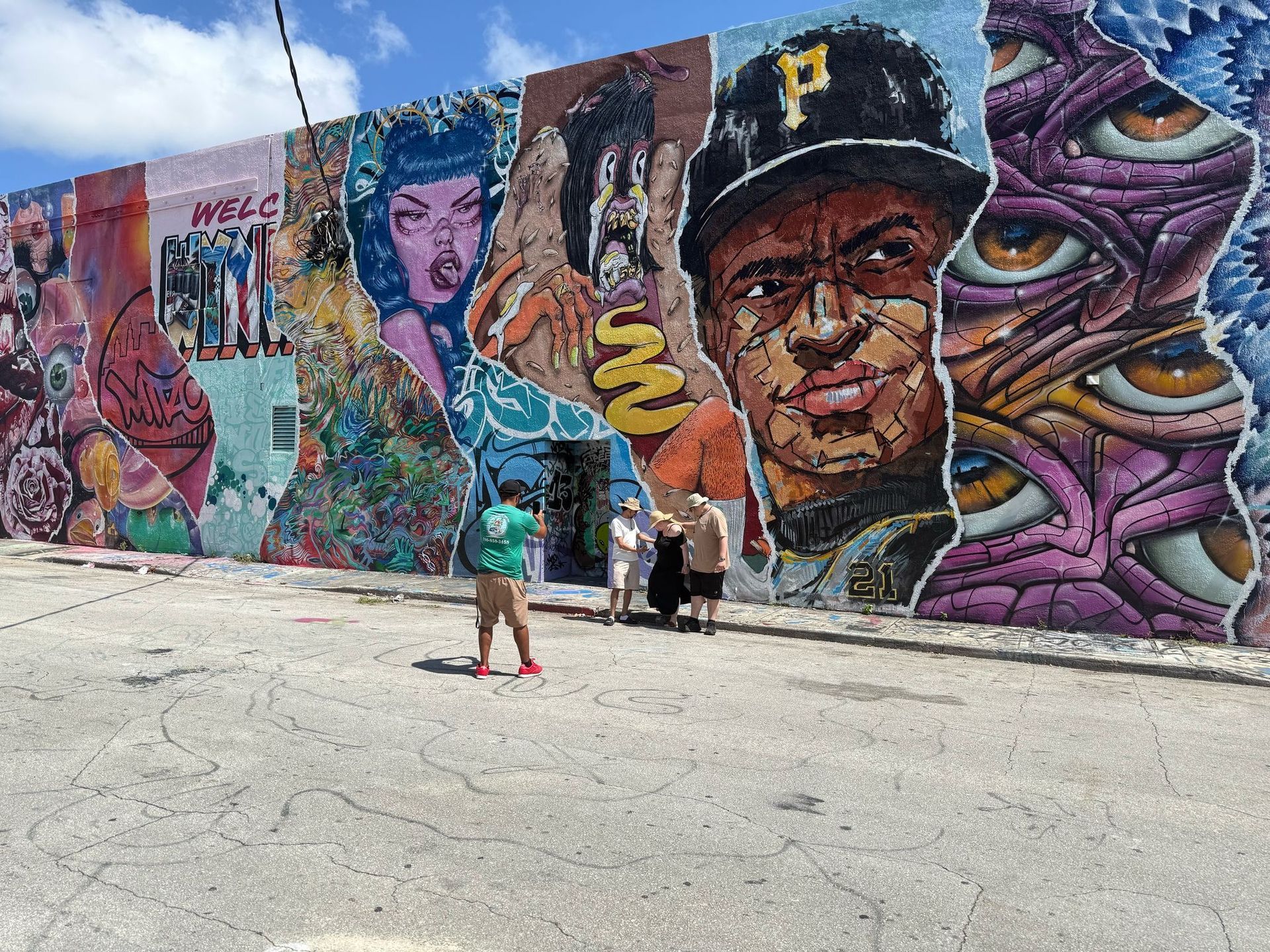 Guest taking photos in Wynwood walls with Tour guide