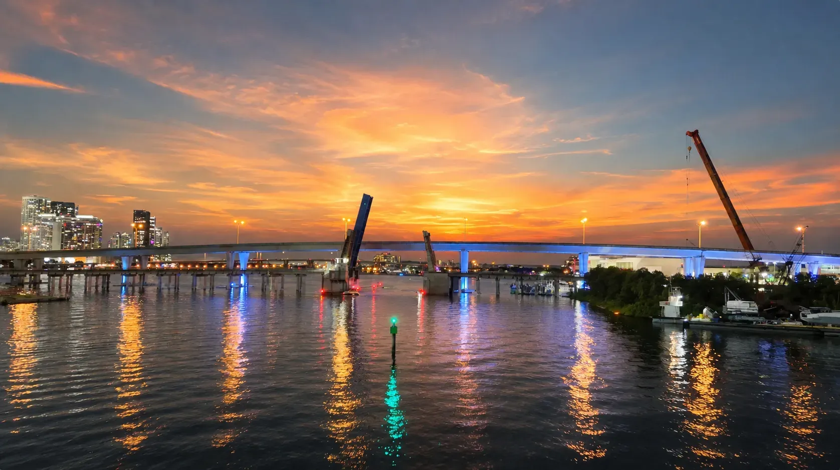 MacArthur Causeway illuminated during a Miami Sunset Cruise on Biscayne Bay