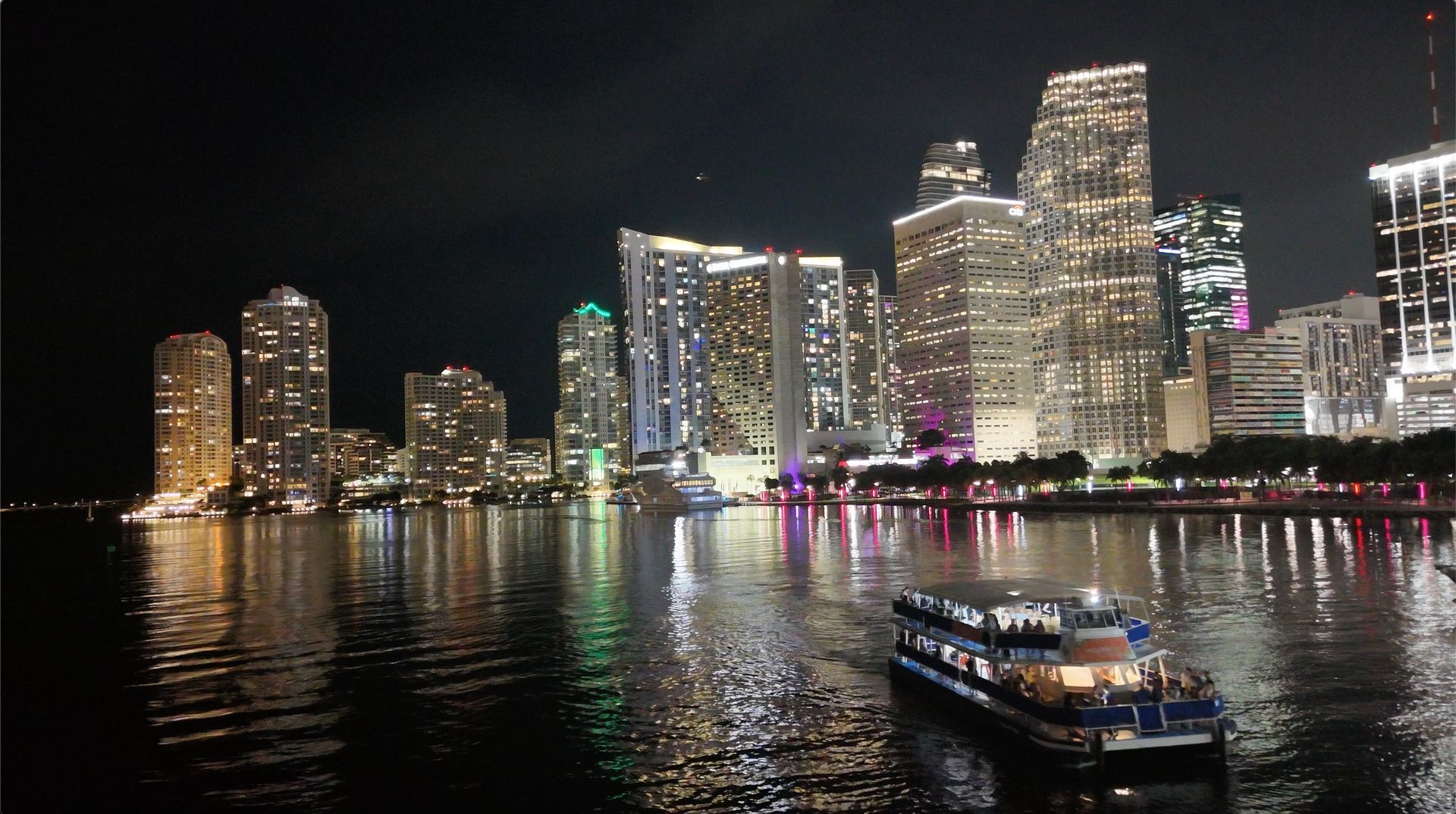 Skyline Miami Cruise at night in Biscayne Bay with the Brickell Skyline in the Background