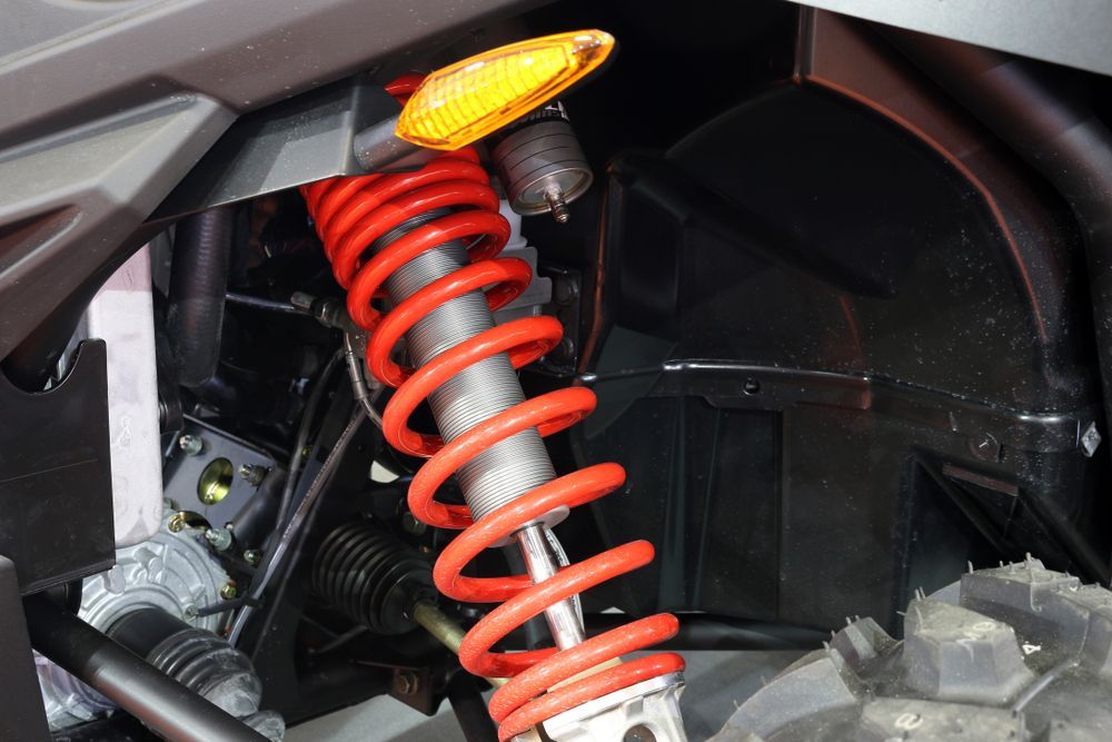 Red Shock Absorber on an Off-road Vehicle — CE Automotive Service Centre in Garbutt, QLD