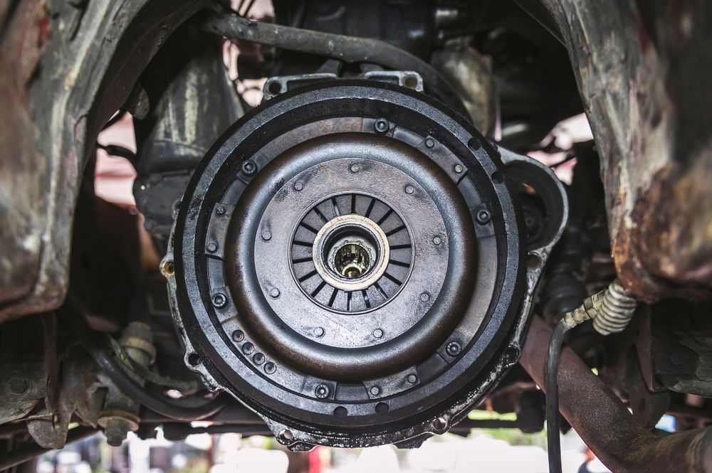 Close-up of a vehicle's exposed clutch assembly — CE Automotive Service Centre in Garbutt, QLD