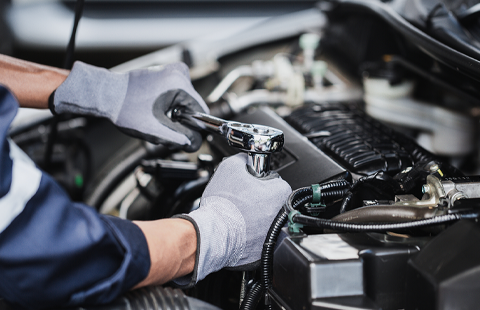 Mechanic working on maintenance for engine | Finger Lakes Automotive & Marine