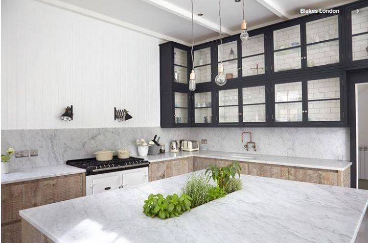Kitchen With White Marble Countertop And Plants — Kitchen Cabinets in Ballina, NSW