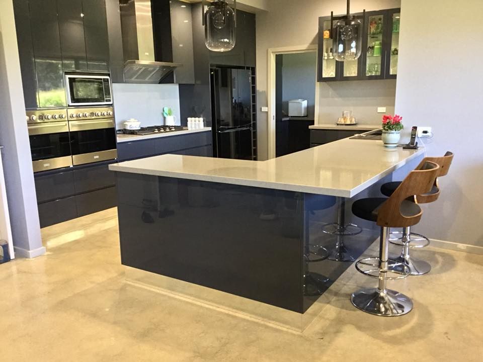 Modern Kitchen With Stool Bar Chairs  — Kitchen Builders in Goonellabah, NSW