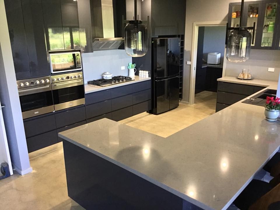 Kitchen With Grey Countertop And Dark Grey Cabinets — Kitchen Cabinets in Ballina, NSW