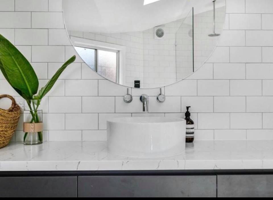 Bathroom With White Sink — Kitchen Cabinets in Byron Bay, NSW