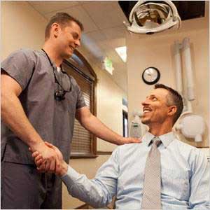 Shaking hand with the patient — Clearfield, UT — Hillside Dental