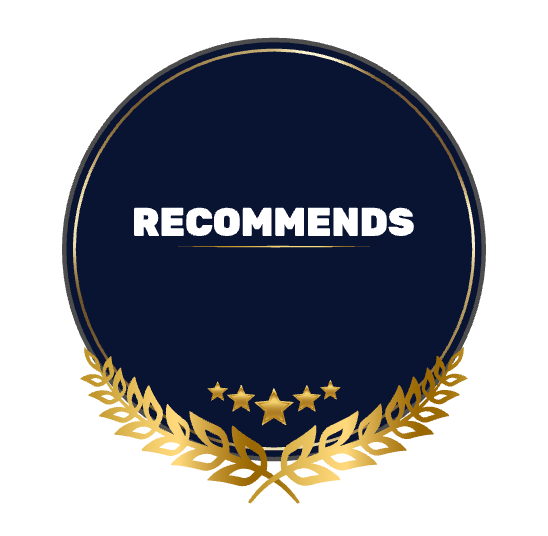 Badge with gold laurel wreath and stars; says