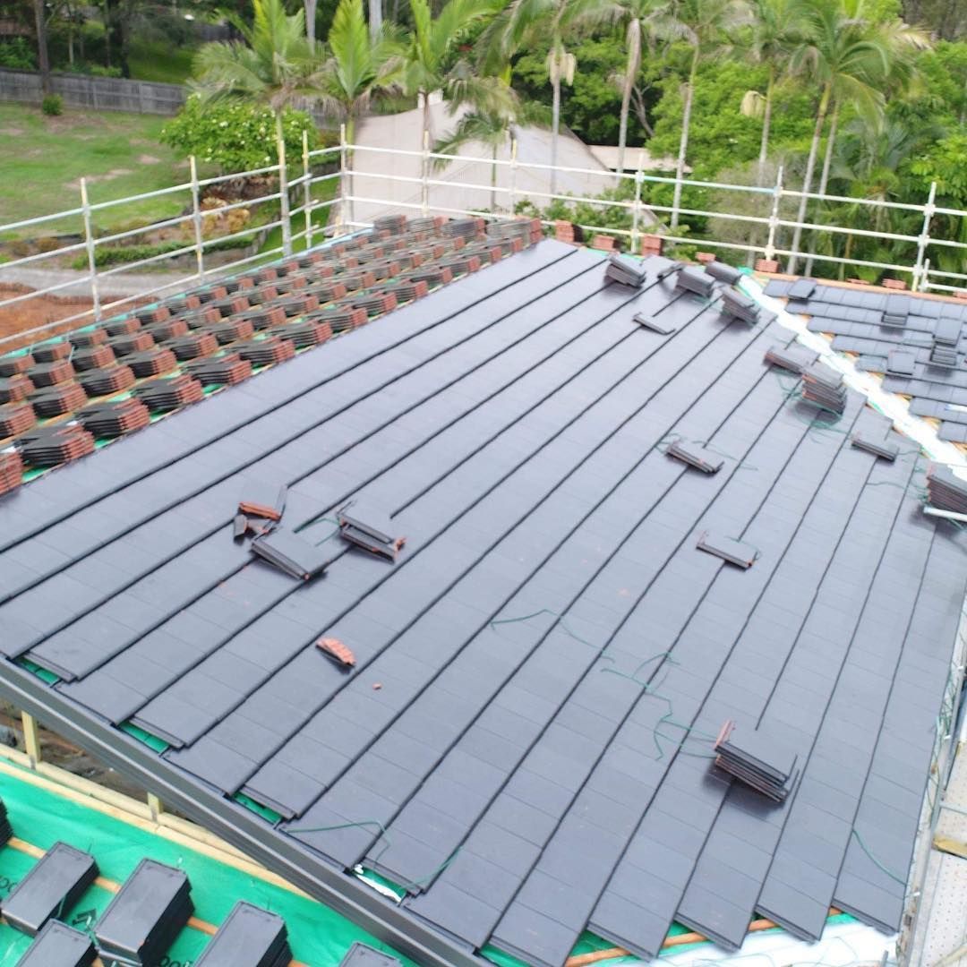 An aerial view of a roof with a lot of tiles on it