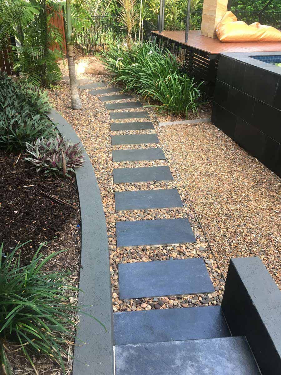 A Stone Walkway Leading to A Staircase in A Garden — Green Vision NT in Virginia, NT