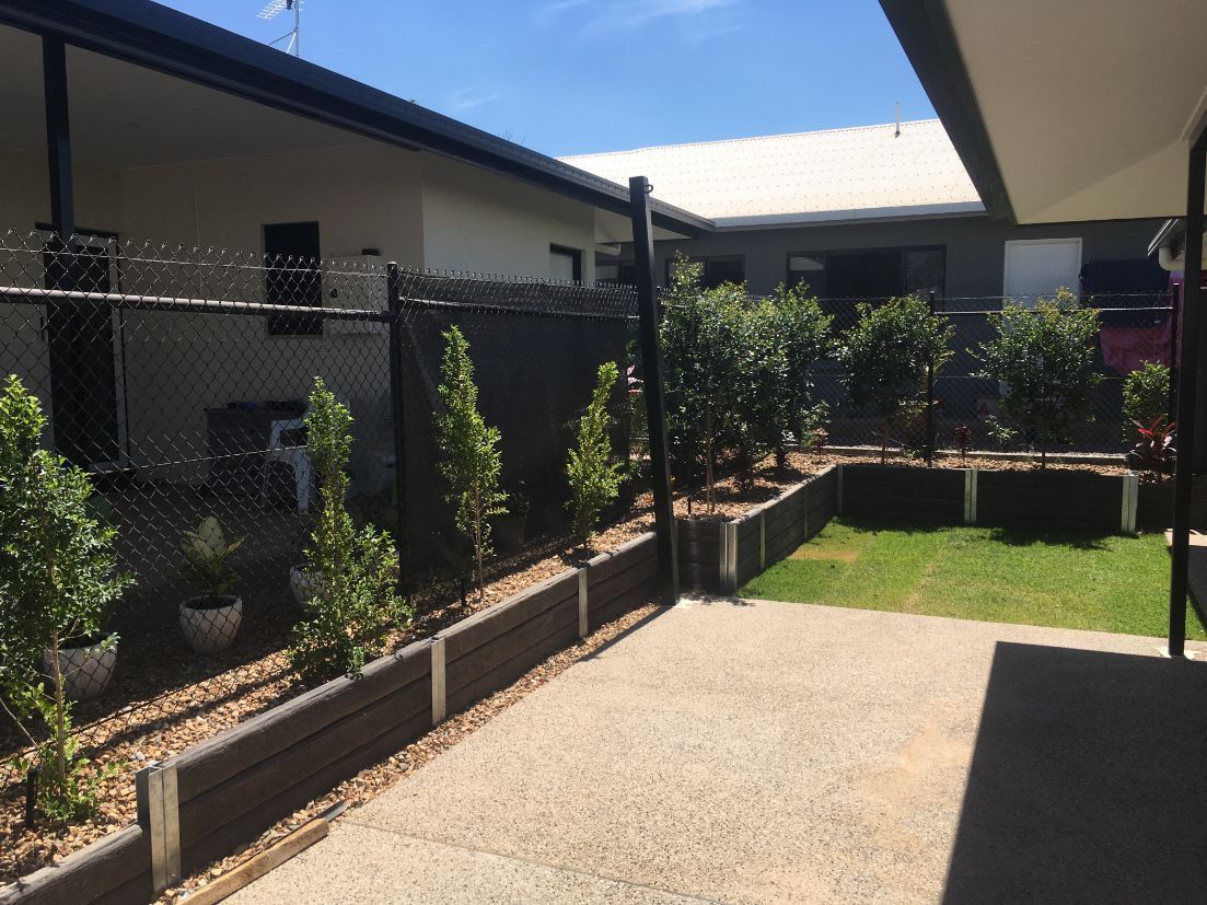 A House with A Fence and A Patio with A Lot of Plants — Green Vision NT in Lee Point, NT
