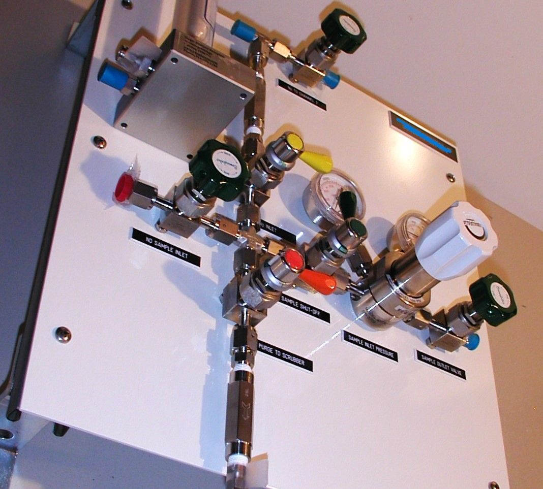 A white board with a bunch of valves on it