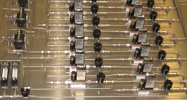 A bunch of wires are connected to each other on a metal surface