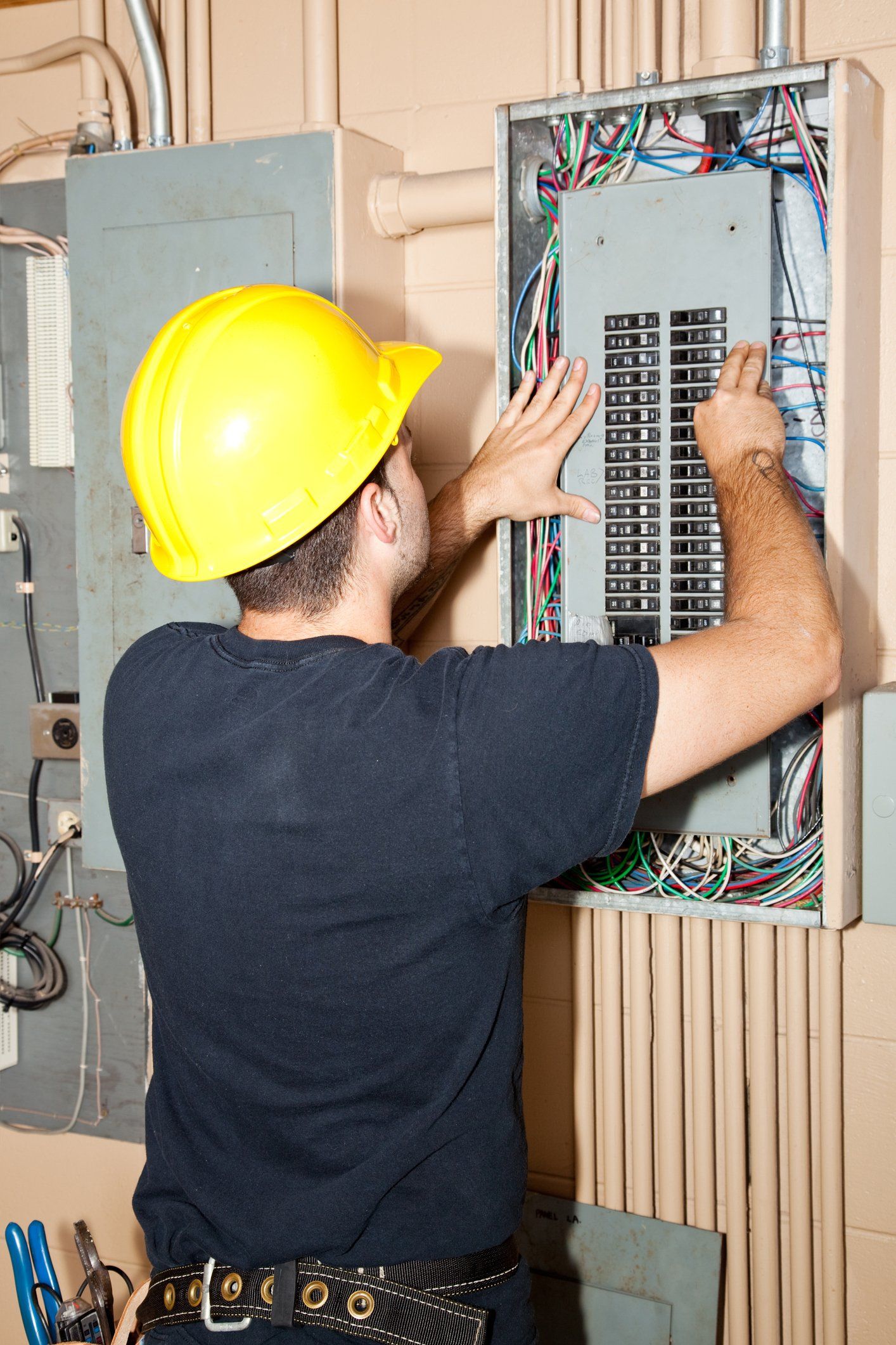 Man checking an electrical box