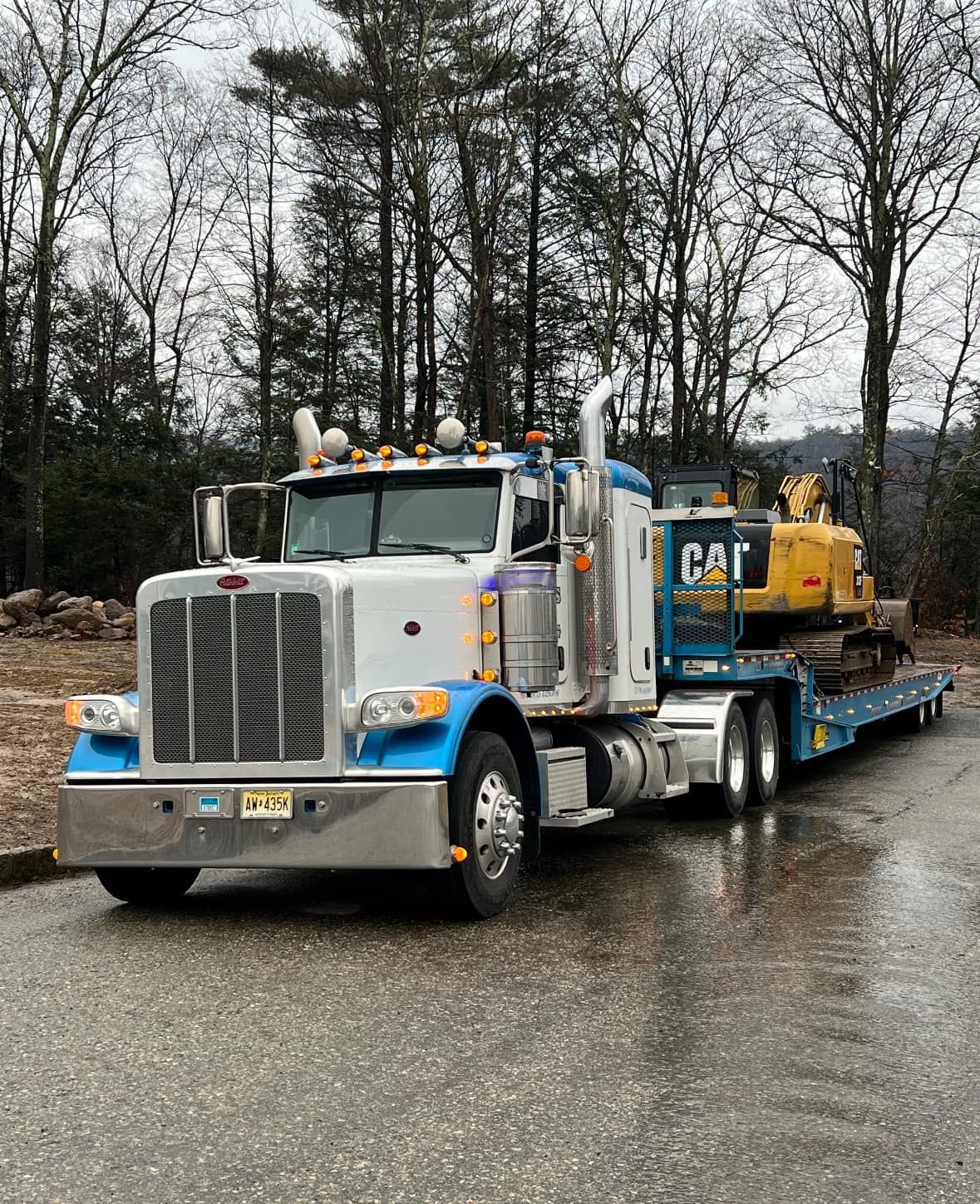 Heavy machinery transport in Bergen County NJ by Nick’s 24 Hour flatbed towing service.
